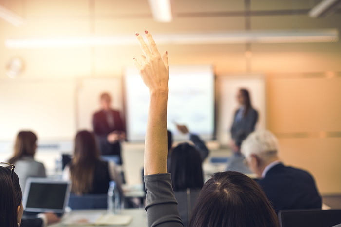 Raising Hand at Meeting